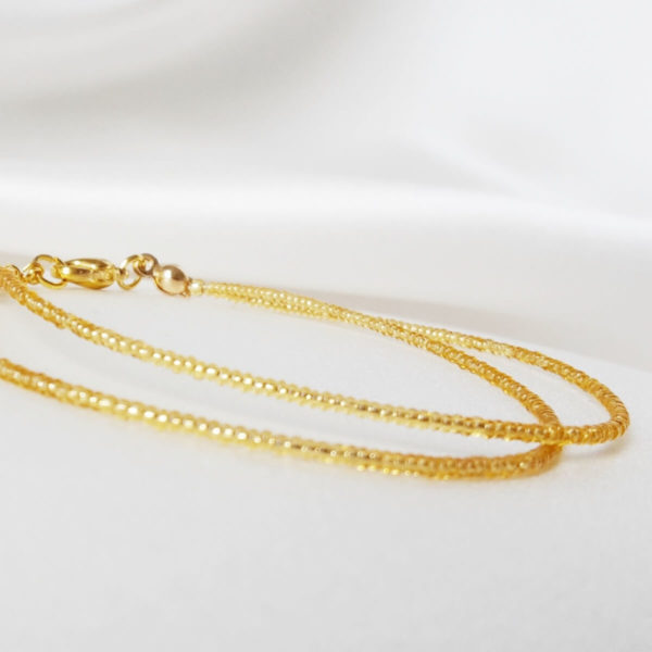 bracelet-mariée-doré-perles-simple bracelet de mariée minimaliste sur deux rangs en perles de rocailles dorées transparentes