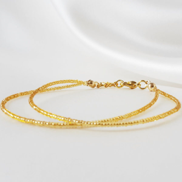 bracelet-mariée-doré-perles-simple bracelet de mariée minimaliste sur deux rangs en perles de rocailles dorées transparentes