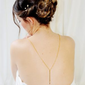 collier de dos sautoir chaine dorée et perle tube et perles à facettes dorées